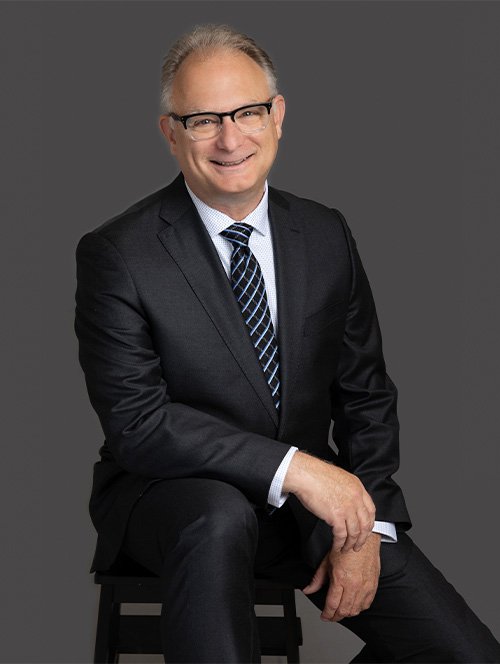 Photo of Al Acitelli wearing a suit